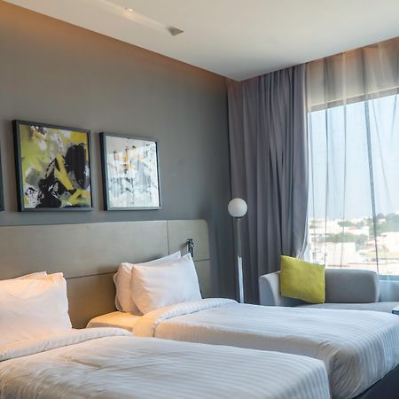 Novotel Chennai Chamiers Road Exterior foto Deluxe Room